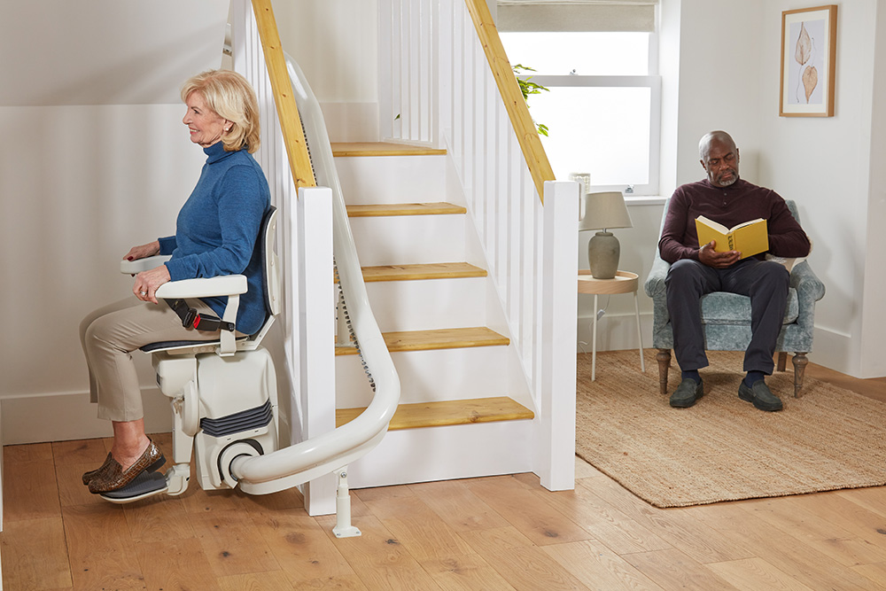 ULTIMATE_Lift Bottom of Stairs with Lady Sat down and Man in Armchair